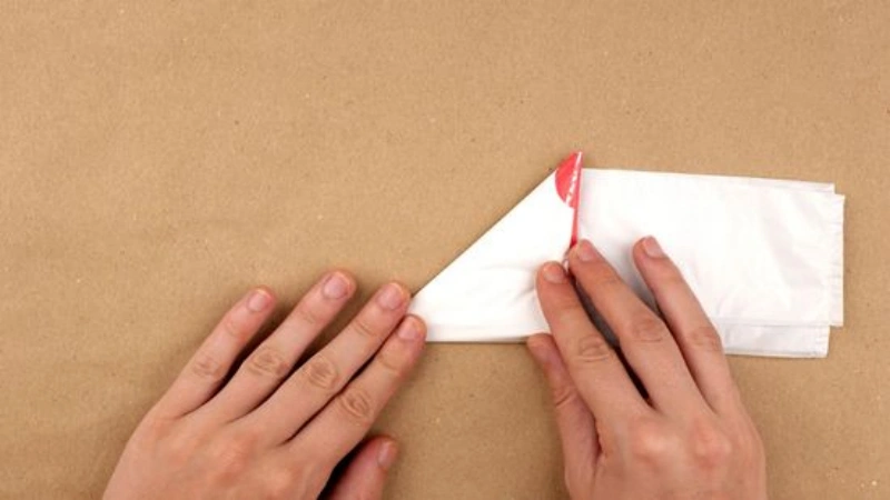 How to Fold Plastic Bags: A Comprehensive Guide 2025 2 triangle fold